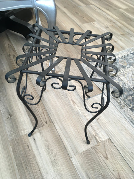 Black wrought iron plant stand