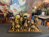 Brass look vases on tray