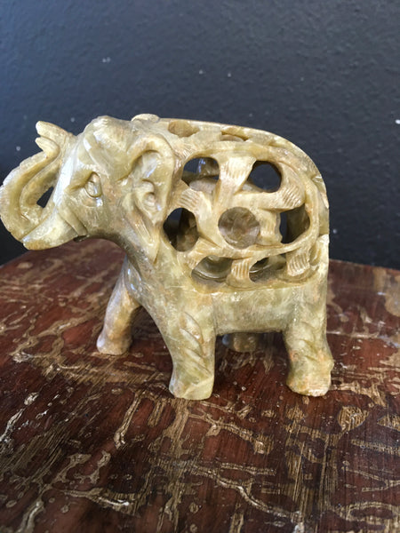 Carved elephant inside carved elephant