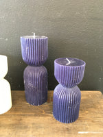 Set of dark blue candles