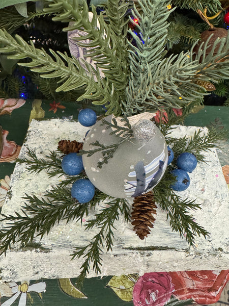 Book with blue ornament