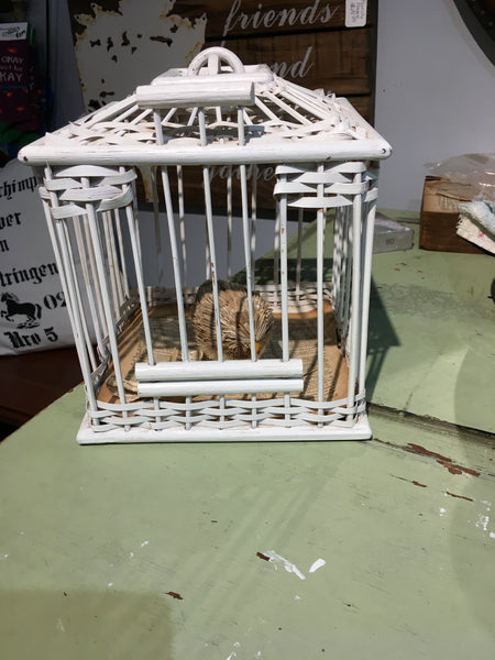 White wicker bird cage